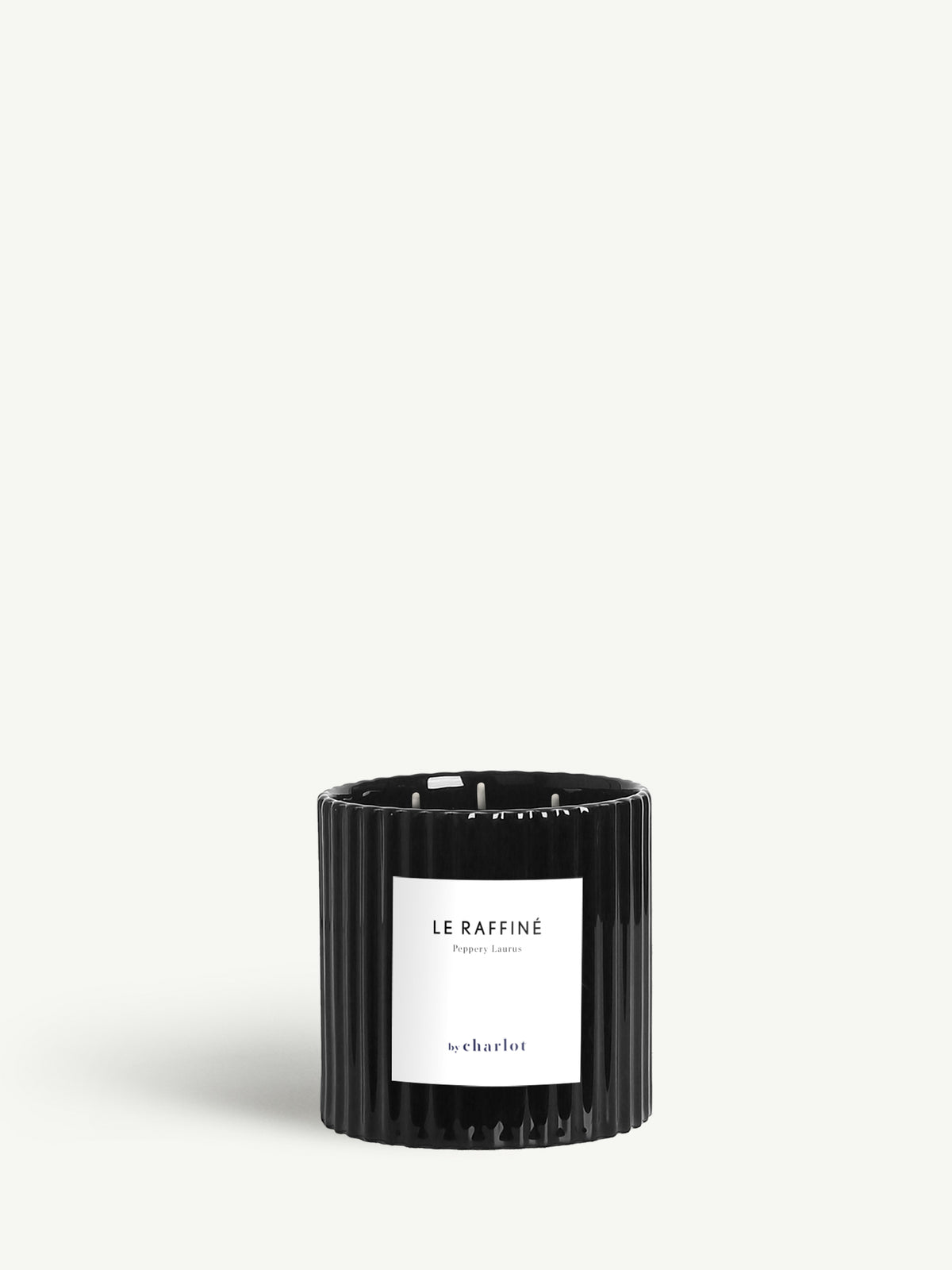 Bougie Le Raffiné grand format, pot cannelé en céramique noire