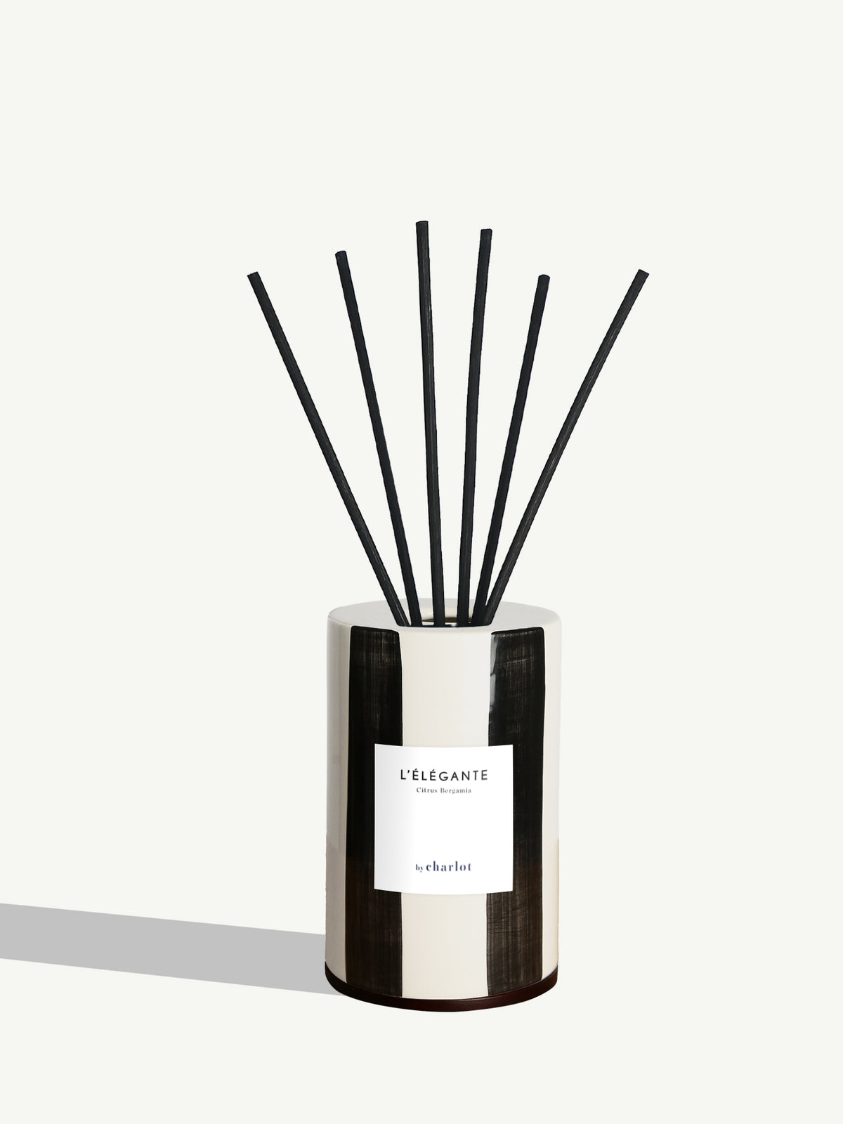 Diffuseur L'Élégante, cloche en céramique rayée noir réglisse et tiges de rotin