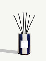 Diffuseur Le Voyageur, cloche en céramique rayée bleu marine et tiges de rotin